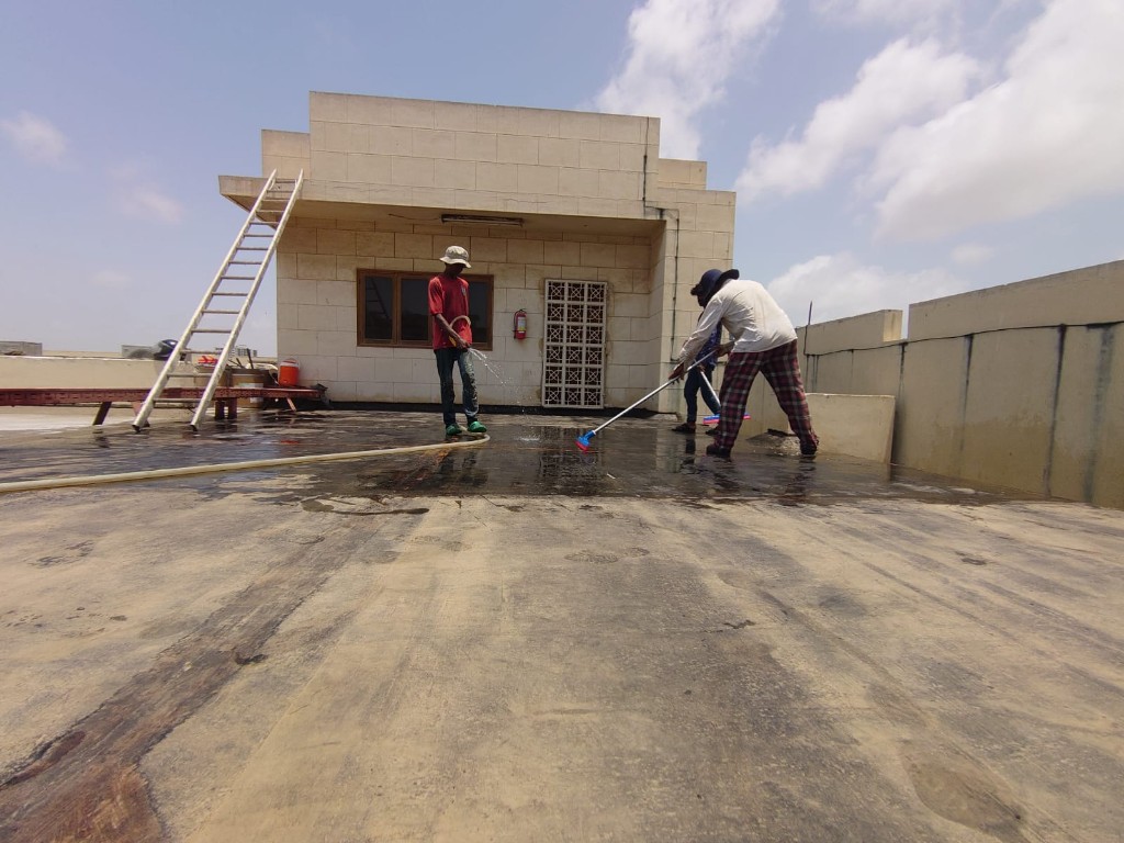 Industrial corrugated roof split between treated and untreated sections